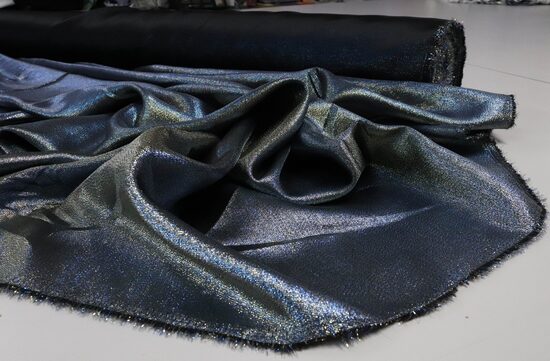 1293-MOCNO MIENIĄCA TKANINA KOSTIUMOWA 